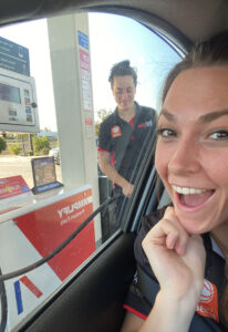 Chloe filling the car up with petrol before we returned them to the car rental.